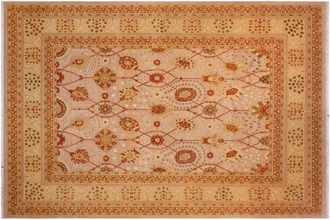 An ornate rectangular area rug with a cream and beige field, decorated with intricate red, orange, and brown floral and geometric patterns, surrounded by a wide matching border.